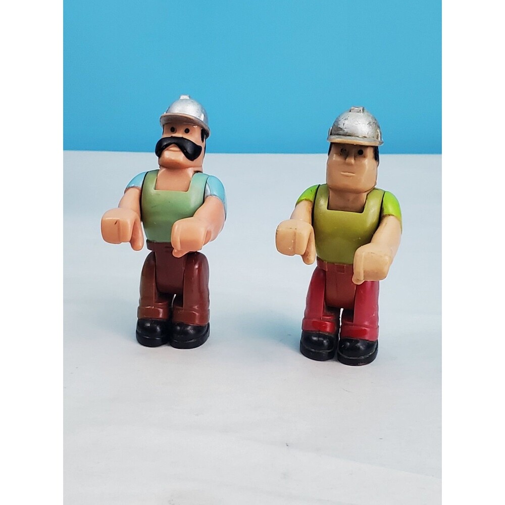 This listing features a lot of two vintage chunky plastic construction worker...